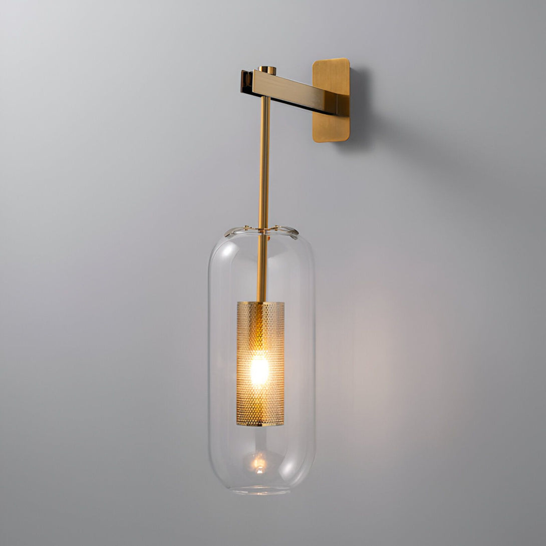 Une applique murale en laiton avec un abat-jour en verre transparent et une grille en métal perforé. DY-3966329891,DY-2145180516,
