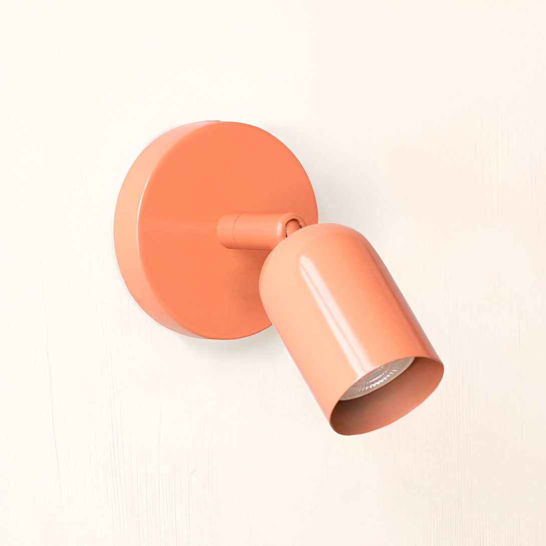 Une image d'une applique murale d'intérieur de couleur orange. L'applique est de forme ronde et est fixée au mur par une platine ronde. L'abat-jour est orientable. L'applique est en métal et est disponible en plusieurs coloris. TE-7309564863,TE-9853195267,TE-7522380383,TE-5658803926,TE-5821050316,TE-2589592698,TE-4180751216,TE-4496791870,TE-8887859868,TE-6287220465,TE-2747845370,TE-8944461651,TE-4374213783,TE-7194732947,TE-2718848030,