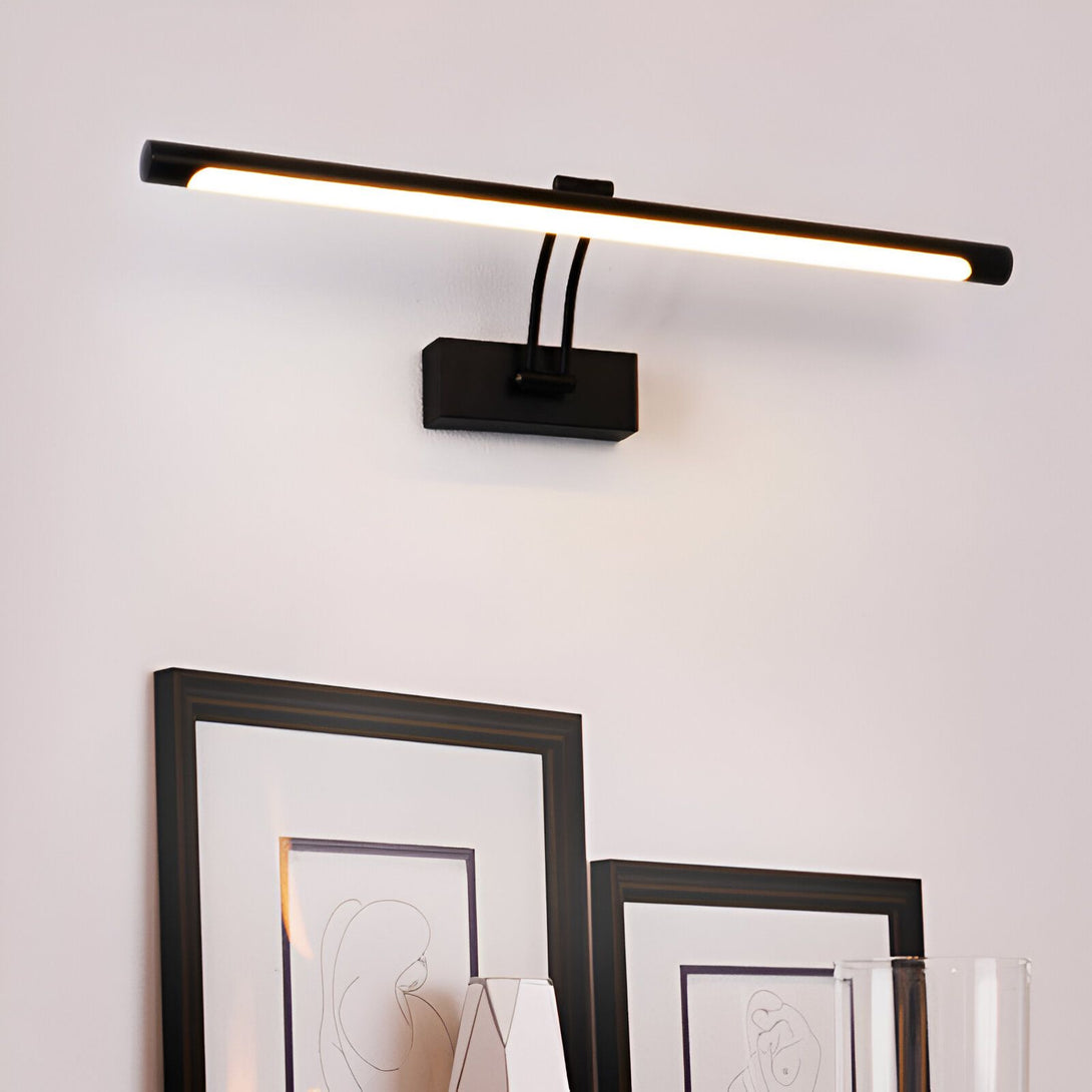 Une image d'une applique murale LED noire avec un interrupteur. L'applique est montée sur un mur blanc et est allumée. Il y a deux cadres noirs avec des dessins blancs accrochés au mur à côté de l'applique. EX-1604956739,EX-7421113479,EX-5523457469,EX-0999315927,EX-9040306907,EX-1781853169,EX-4936903833,EX-8774169653,EX-0756517885,EX-8281765852,EX-978106059X,EX-378223541X,EX-0246508582,EX-8389967979,EX-2442312484,EX-2992506680,