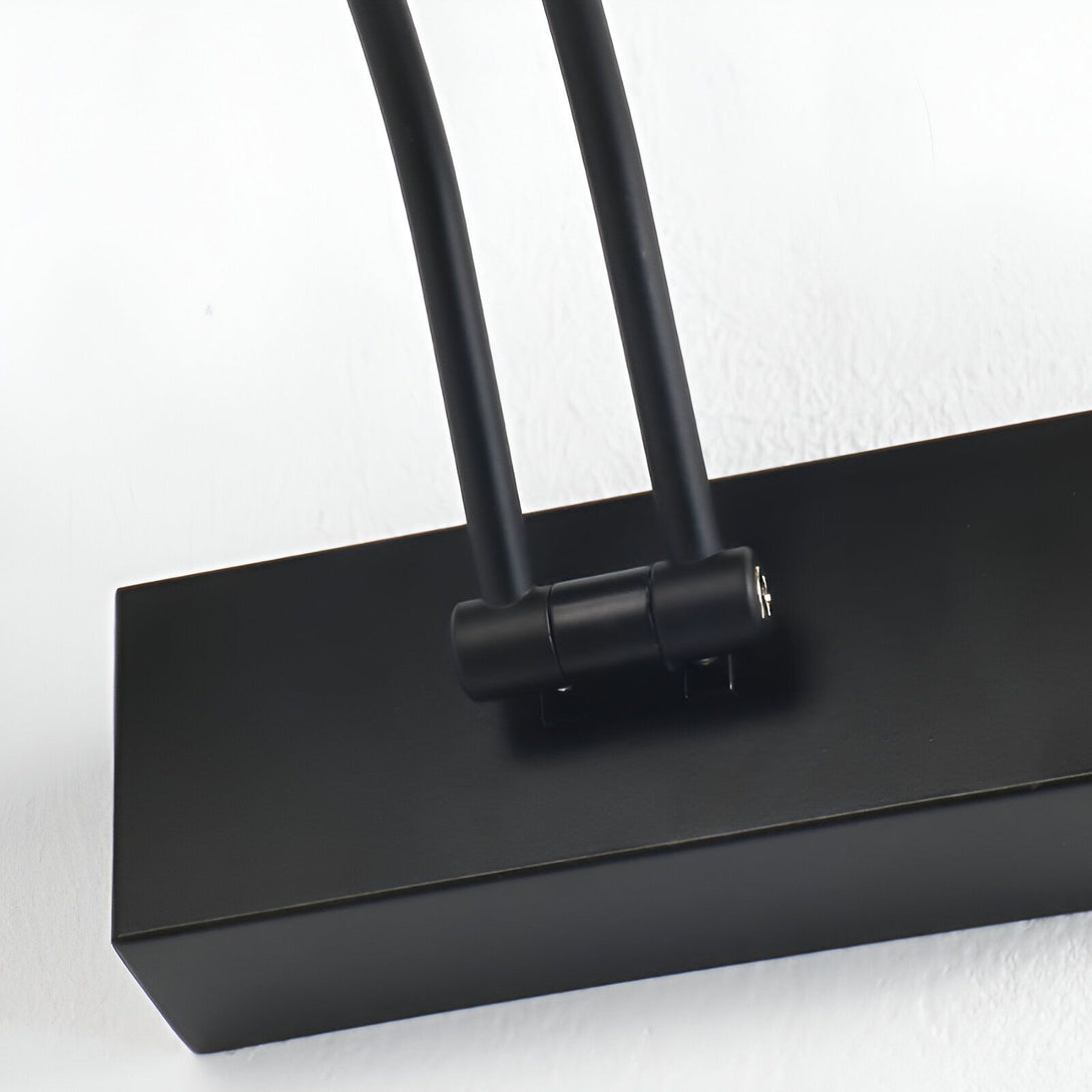 Une image d'un lampadaire mural noir avec deux bras flexibles. EX-1604956739,EX-7421113479,EX-5523457469,EX-0999315927,EX-9040306907,EX-1781853169,EX-4936903833,EX-8774169653,EX-0756517885,EX-8281765852,EX-978106059X,EX-378223541X,EX-0246508582,EX-8389967979,EX-2442312484,EX-2992506680,
