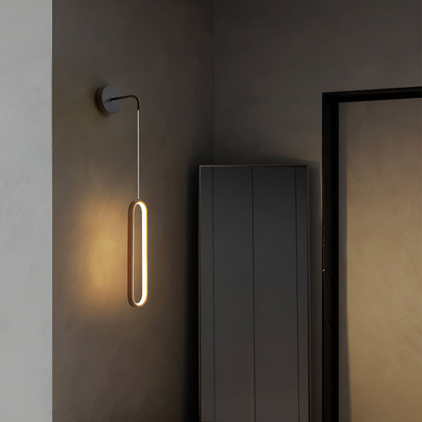 Une applique murale noire avec un cordon et une lumière LED blanche en forme d'ellipse. MI-1348352620,MI-8898474512,MI-6059523110,MI-1272584577,