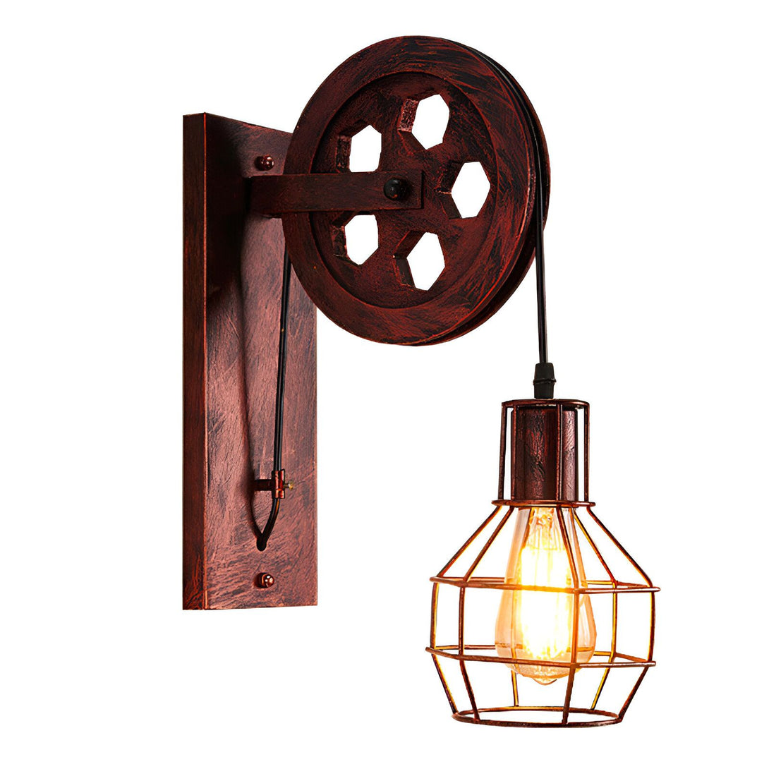 Une applique murale industrielle avec une poulie et une cage en métal. JO-990895248X,JO-0941741435,JO-6688062364,JO-716467275X,