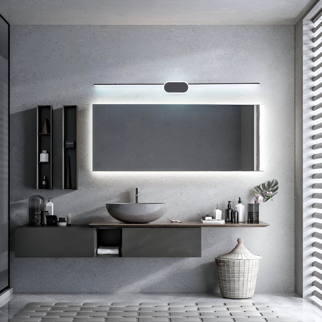 Une salle de bain moderne avec un miroir éclairé, une vasque en pierre et un meuble sous-vasque en bois. MI-6915102337,MI-0330593730,MI-5996903350,MI-4259598651,MI-4648252829,MI-2554064091,MI-7292630022,MI-4805443642,MI-0099100045,MI-6455049896,MI-0051394502,MI-854697764X,