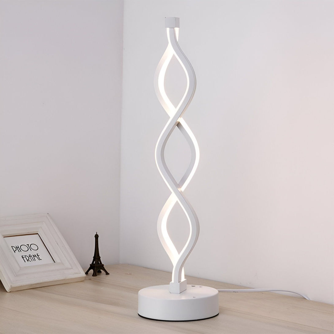 Une lampe de table blanche en forme de spirale. IN-761638868X,IN-2865725197,IN-8287419824,IN-8037118681,