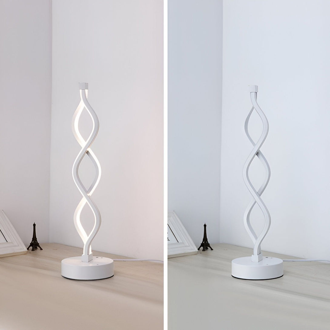 Une lampe de bureau blanche en forme de spirale. La lampe est allumée et émet une lumière blanche chaude. IN-761638868X,IN-2865725197,IN-8287419824,IN-8037118681,
