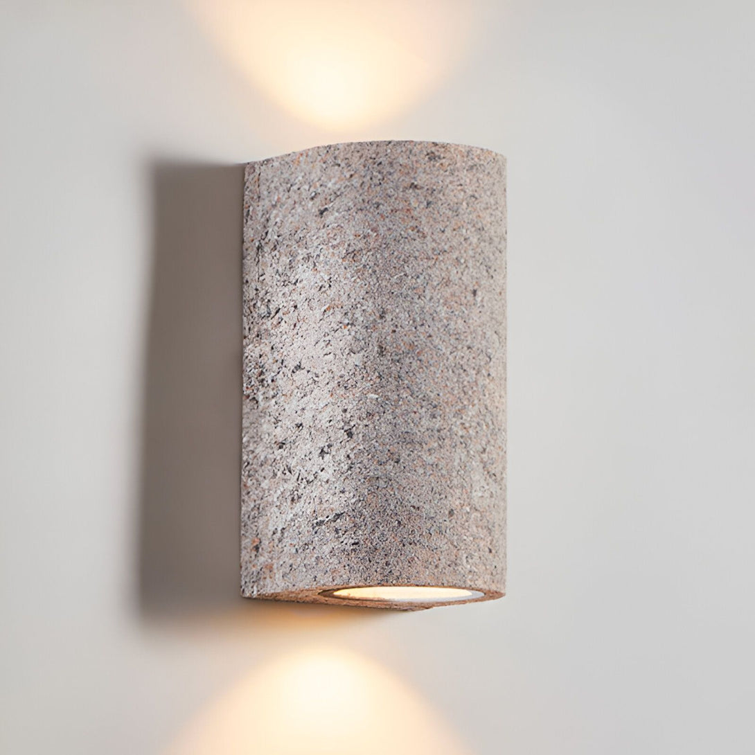 Une applique murale en granit avec deux lumières. NA-3923317158,NA-6067964244,NA-3358865746,NA-2876745291,NA-6391241465,