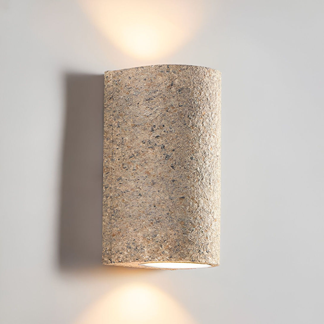 Une applique murale en pierre beige avec deux lumières. NA-3923317158,NA-6067964244,NA-3358865746,NA-2876745291,NA-6391241465,