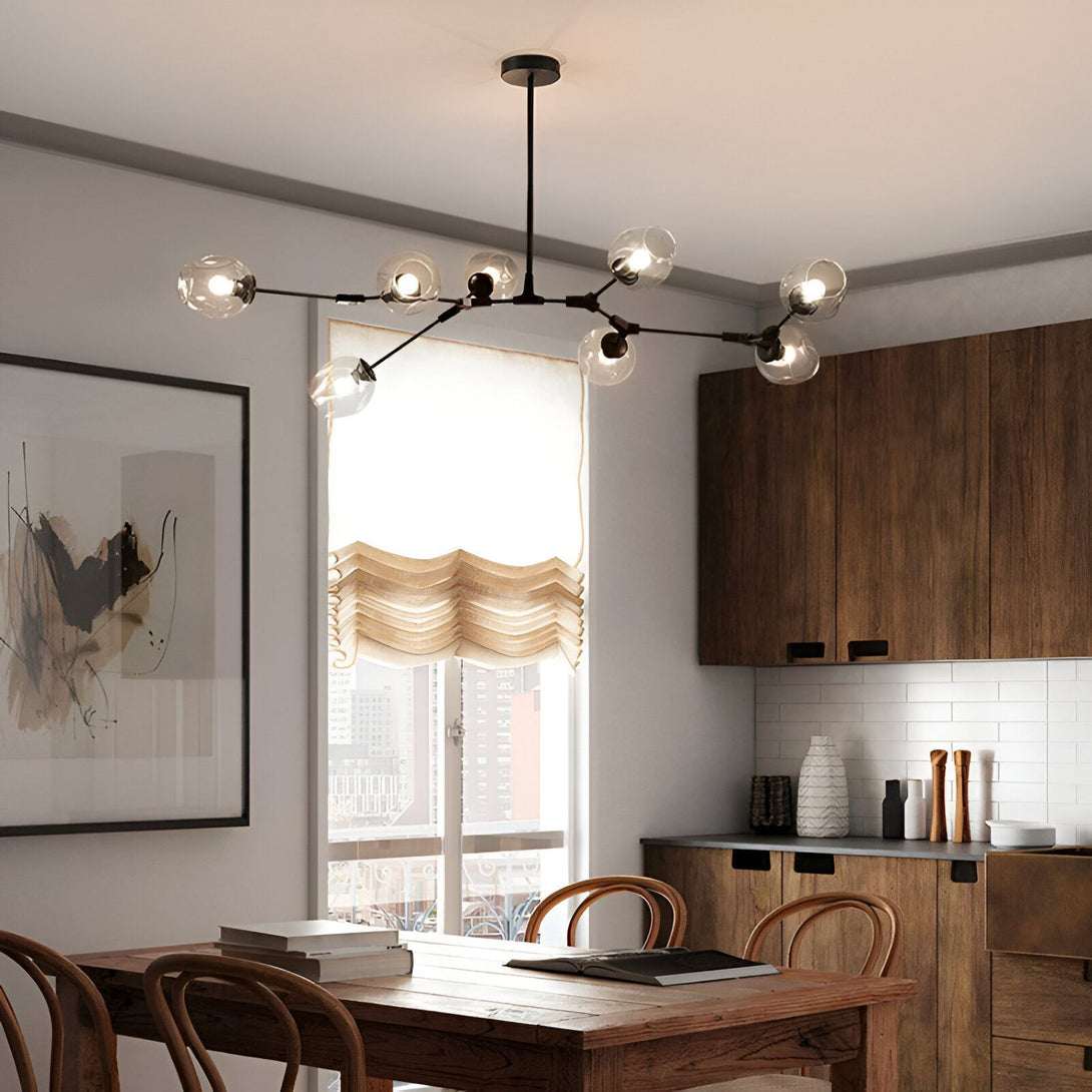 Une image d'une salle à manger avec une table en bois, des chaises en bois, un tapis, une armoire, un rideau, une fenêtre et une lampe au plafond.