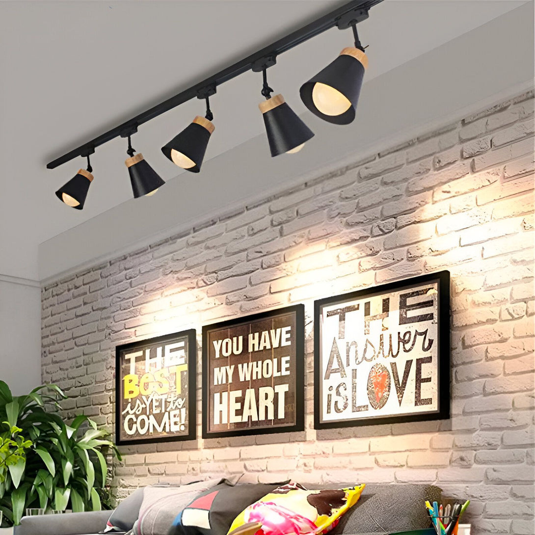 Ce produit est un luminaire spot. Il est de couleur noire et possède cinq spots orientables. Il est parfait pour éclairer un salon, une salle à manger ou une cuisine.