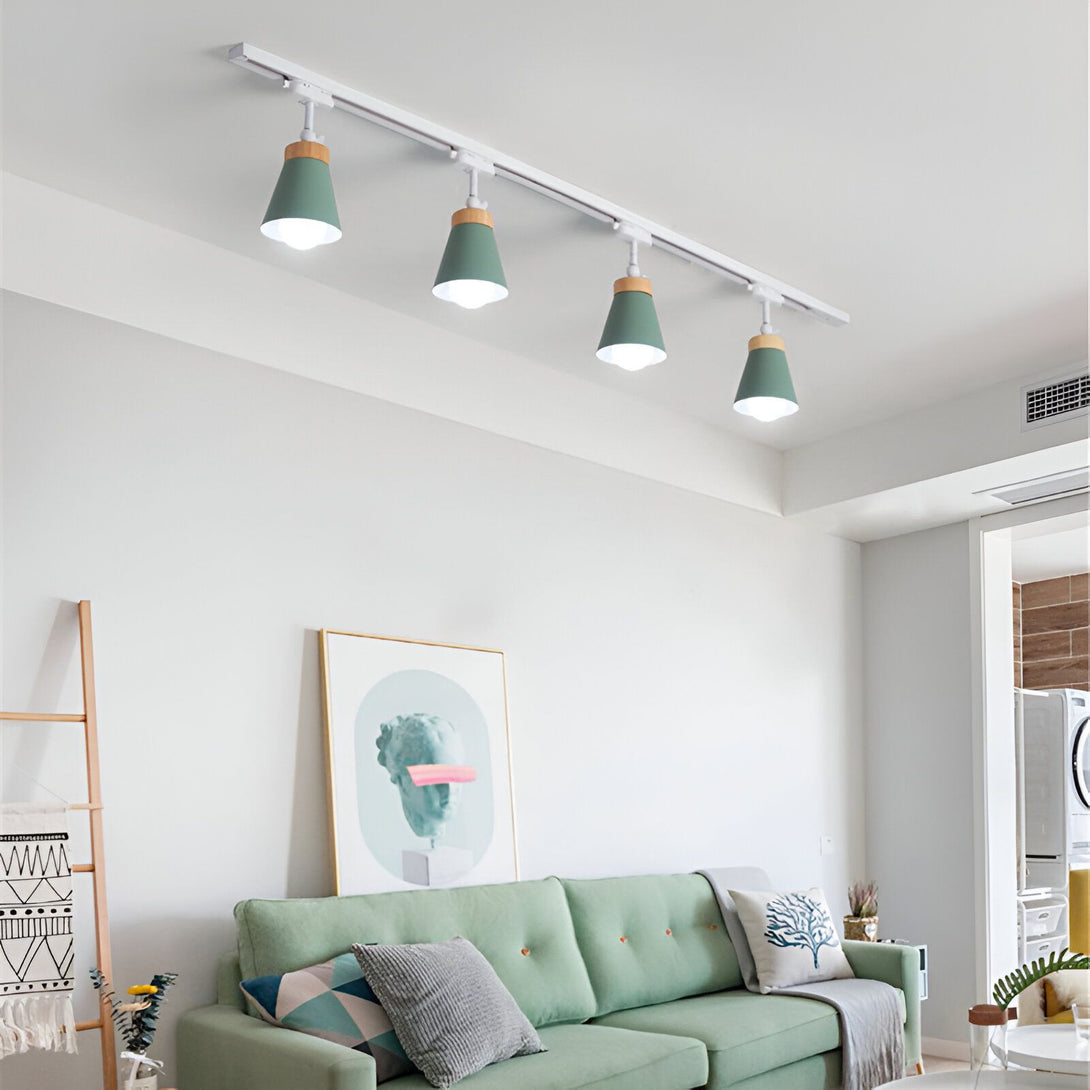 Le luminaire spot est un luminaire design et moderne qui s'intégrera parfaitement dans votre intérieur. Il est composé de quatre spots orientables, ce qui vous permettra de diriger la lumière comme vous le souhaitez. Les spots sont en métal et ont une finition verte. Le luminaire est également disponible en noir et en blanc.