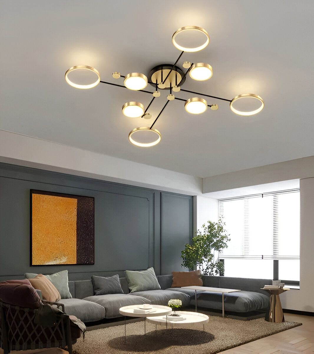 Un plafonnier doré à LED avec des cercles en métal noir. Il est parfait pour un salon ou une salle à manger. MA-5176658445,MA-6863690586,MA-9597621967,
